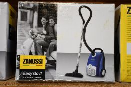 A new Zanussi Easy Go ll Blue 3L, 700W, 7.5M radius retractable cord vacuum cleaner.