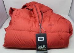 An as new Jack Wolfskin Crystal Palace coat in coral red (S - Slight dirt mark around hood when