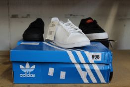 Three pairs of as new Adidas trainers; Stan Smith, Continental Vulc and Busenitz Vulc II (All UK