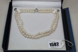 A double string fresh water cultured pearl necklace with silver clasp 925 clasp 45cml.