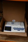 A pre-owned Mortara Instrument ELI150 RX cardiograph (Item untested, viewing advised).
