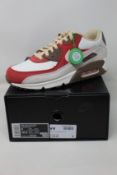 A pair of as new Nike Air Max 90 NRG with authentication tag (UK 8).