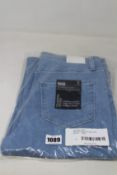 A pair of as new Paige Relaxed Colette jeans (Size 30).