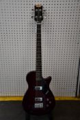 A Gretsch Electromatic Bass Guitar.