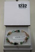 Two as new Coeur De Lion Geo Cube Gree-Beige and Rose Bracelet 4905/30-0510 (RRP £95).