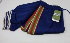 A pair of as new Gucci sweatpants (S).