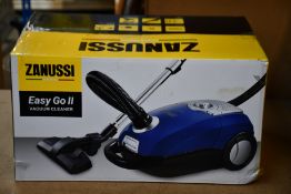 A new Zanussi Easy Go ll Blue 3L, 700W, 7.5M radius retractable cord vacuum cleaner.