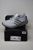 A pair of as new Adidas Ultra4D (UK 6.5).
