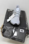 A pair of as new Adidas Ultra4D (UK 6.5 - Damaged box).