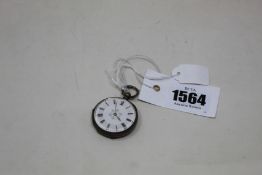 A ladies white metal pocket watch with floral centre.