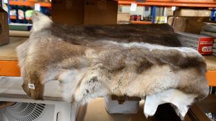 A Reindeer Hide Rug.
