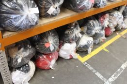 Twelve bags of pre-owned clothing and related items.