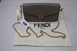 An as new Fendi wallet on chain in dove and soft gold (RRP £850).