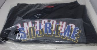 An as new Supreme Stacked crew neck sweater (M).