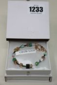 Two as new Coeur De Lion Geo Cube Gree-Beige and Rose Bracelet 4905/30-0510 (RRP £95).