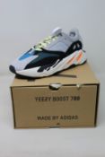 A pair of as new Adidas Yeezy Boost 700 with authentication tag (UK 9).