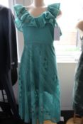 An as new Three Floor dress in green (UK 12).