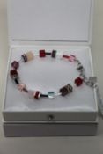 Two as new Coeur De Lion Red Purple Swarovski Crystal Bracelet 4905/30-0308 (RRP £95).