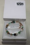 Two as new Coeur De Lion Geo Cube Gree-Beige and Rose Bracelet 4905/30-0510 (RRP £95).