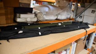 A quantity of branded fishing rods to include; two as new Penn Prevail II Beach, three Kinetic