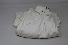 Eleven items of assorted Mama B clothing.