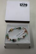 Two as new Coeur De Lion Geo Cube Gree-Beige and Rose Bracelet 4905/30-0510 (RRP £95).