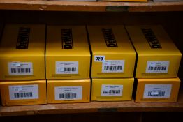 Five boxes of Dewalt Reinforcer mirror lens safety specs and three boxes of Dewalt Contractor Pro