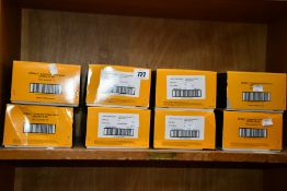 Eight boxes of Dewalt Contractor Pro safety specs (12 items per box).