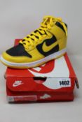 A pair of as new Nike Dunk Hi SP (UK 5).