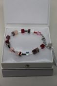 Two as new Coeur De Lion Red Purple Swarovski Crystal Bracelet 4905/30-0308 (RRP £95).