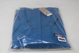 An as new women's Patagonia Torrentshell 3L jacket (M).