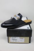 A pair of as new Gucci leather horsebit slippers (EU 38 - RRP £580).