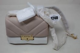 An as new Michael Kors Cece bag.