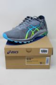 A pair of men's as new Asics GT-1000 10 (UK 8).