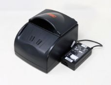 A pre-owned 3M AT9000 Passport/Full page ID Document Scanner (Power supply included).