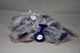 A quantity of as new Hosptrix nurses watches with blue silicon pin/strap (Approximately 25).