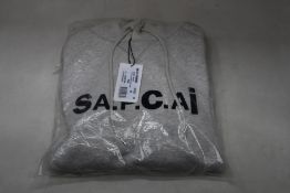 An as new A.P.C. x Sacai Taiyo hoodie in grey (M).