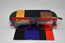 A pair of as new Anne & Valentin glasses frames with case.