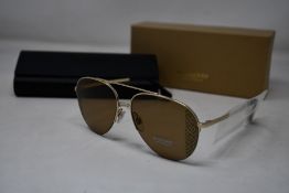 A pair of as new Burberry sunglasses.