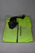 An as new Gore Gore-Tex Paclite jacket in neon yellow (L).