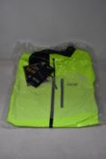 An as new Gore Gore-Tex Paclite jacket in neon yellow (L).