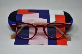 A pair of as new Anne & Valentin glasses frames with case.