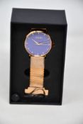 A women's as new Coluri Kahlo watch in violet (RRP £139).