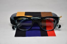 A pair of as new Anne & Valentin glasses frames with case.