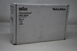 A Braun ThermoScan Pro 6000 ear thermometer.