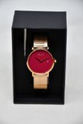 A women's as new Coluri Pankhurst watch in scarlet (RRP £139).