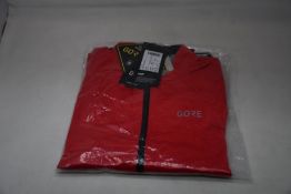 An as new Gore C5 Gore-Tex Active jacket in red (S).
