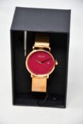 A women's as new Coluri Kahlo watch in scarlet (RRP £139).