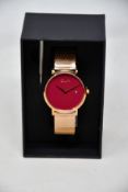 A women's as new Coluri Pankhurst watch in scarlet (RRP £139).
