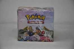 A Pokemon Sword and Shield booster box (Slight tear in seal).